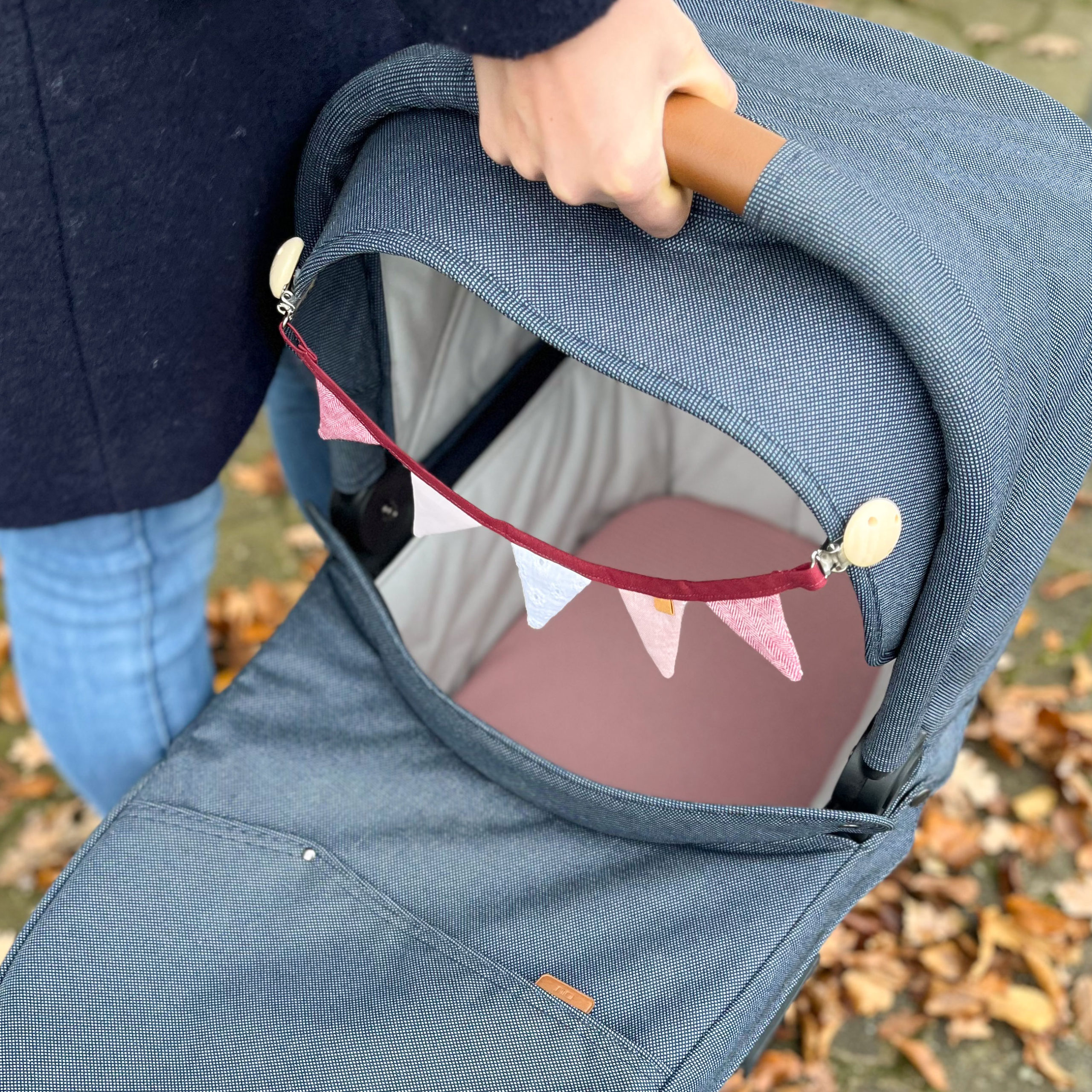 Slingerslinger voor kinderwagens
