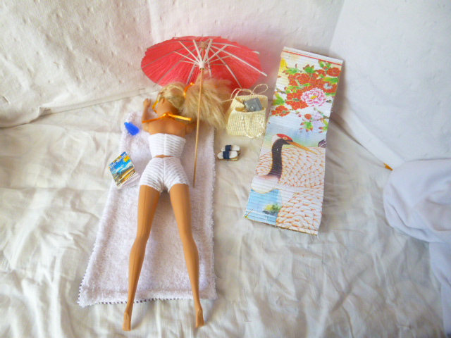 Barbie strandoutfits en accessoires